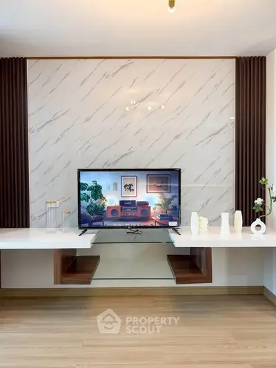 Modern living room with stylish TV setup and elegant decor