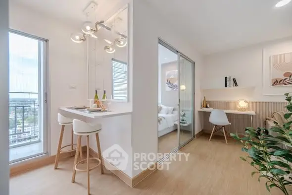 Modern open-plan living area with stylish decor and natural light