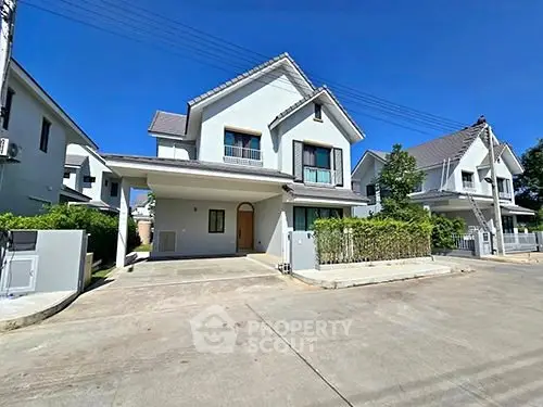 Charming suburban house with spacious driveway and modern architecture