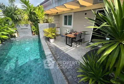 Luxurious outdoor pool area with elegant dining setup and lush greenery