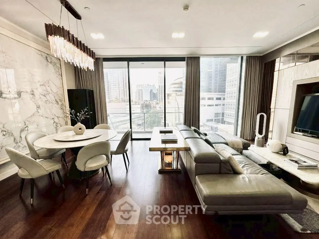 Luxurious modern living room with elegant dining area and stunning city view.
