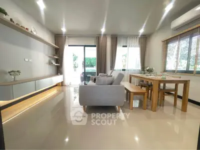 Modern living room with sleek furniture and natural light