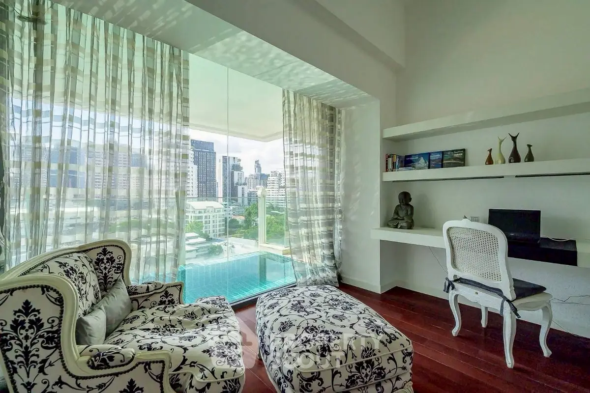 Luxurious study room with elegant furniture and stunning city view