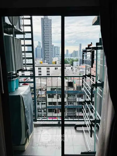 Urban balcony view with city skyline, perfect for enjoying the bustling cityscape from your home.