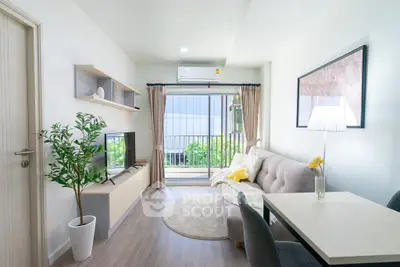 Bright modern living room with balcony and stylish decor