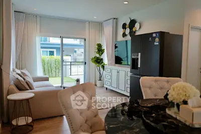 Modern living room with elegant decor and large window view