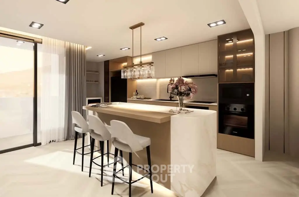Luxurious modern kitchen with island and elegant lighting in open layout design