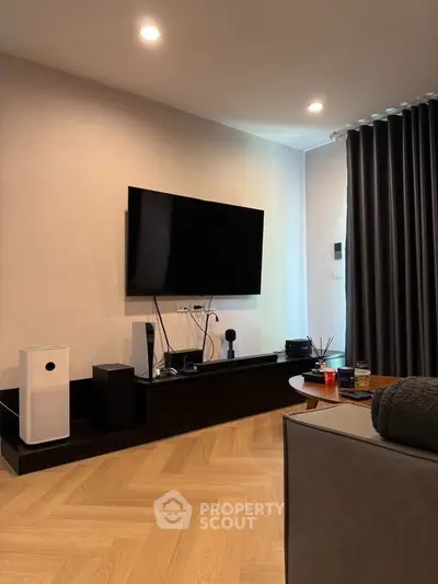 Modern living room with sleek TV setup and stylish decor