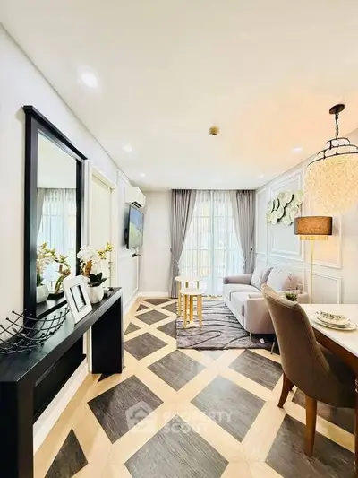 Elegant living room with stylish decor and modern furniture, featuring a cozy dining area and large windows.
