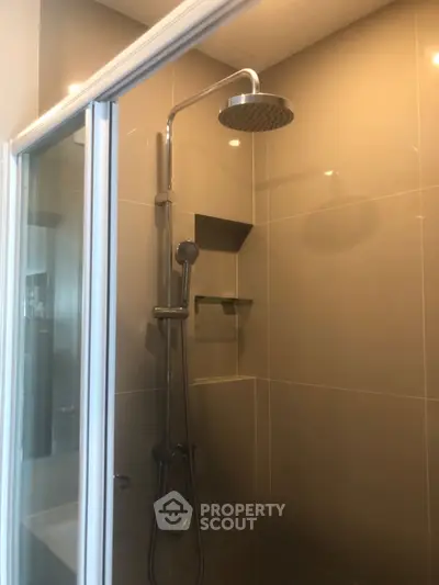 Modern bathroom with sleek shower design and glass door enclosure