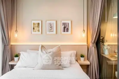 Elegant bedroom with modern decor, soft lighting, and stylish artwork above the bed.