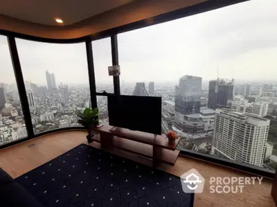 Luxurious living room with panoramic city view from high-rise apartment