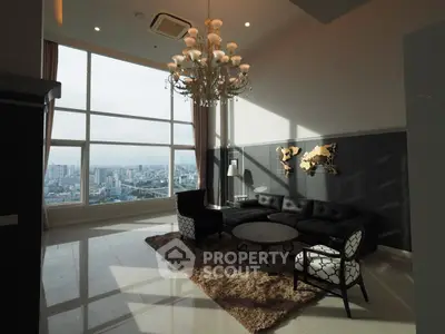 Luxurious high-rise living room with stunning city view and elegant chandelier.