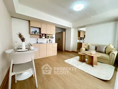 Modern living room with cozy seating and stylish dining area