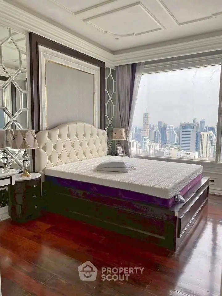 Luxurious bedroom with stunning city view and elegant decor