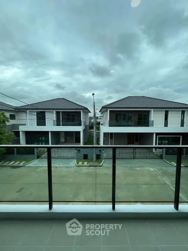 Modern residential neighborhood view from balcony on a cloudy day