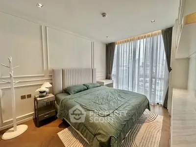 Luxurious bedroom with modern decor and large windows offering city views.