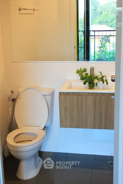 Modern bathroom with sleek fixtures and natural light