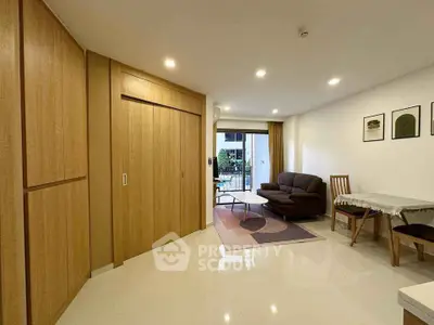 Modern living room with wooden accents and balcony view