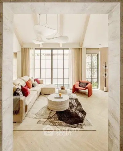 Luxurious modern living room with elegant decor and large windows