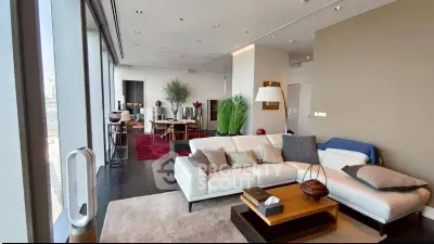 Luxurious modern living room with elegant decor and stunning city view