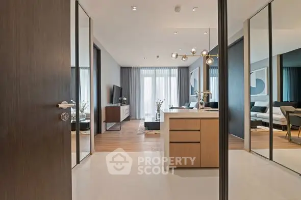 Luxurious modern living room with elegant decor and open layout, featuring floor-to-ceiling windows and stylish lighting.