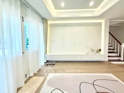 Spacious modern living room with elegant decor and natural light