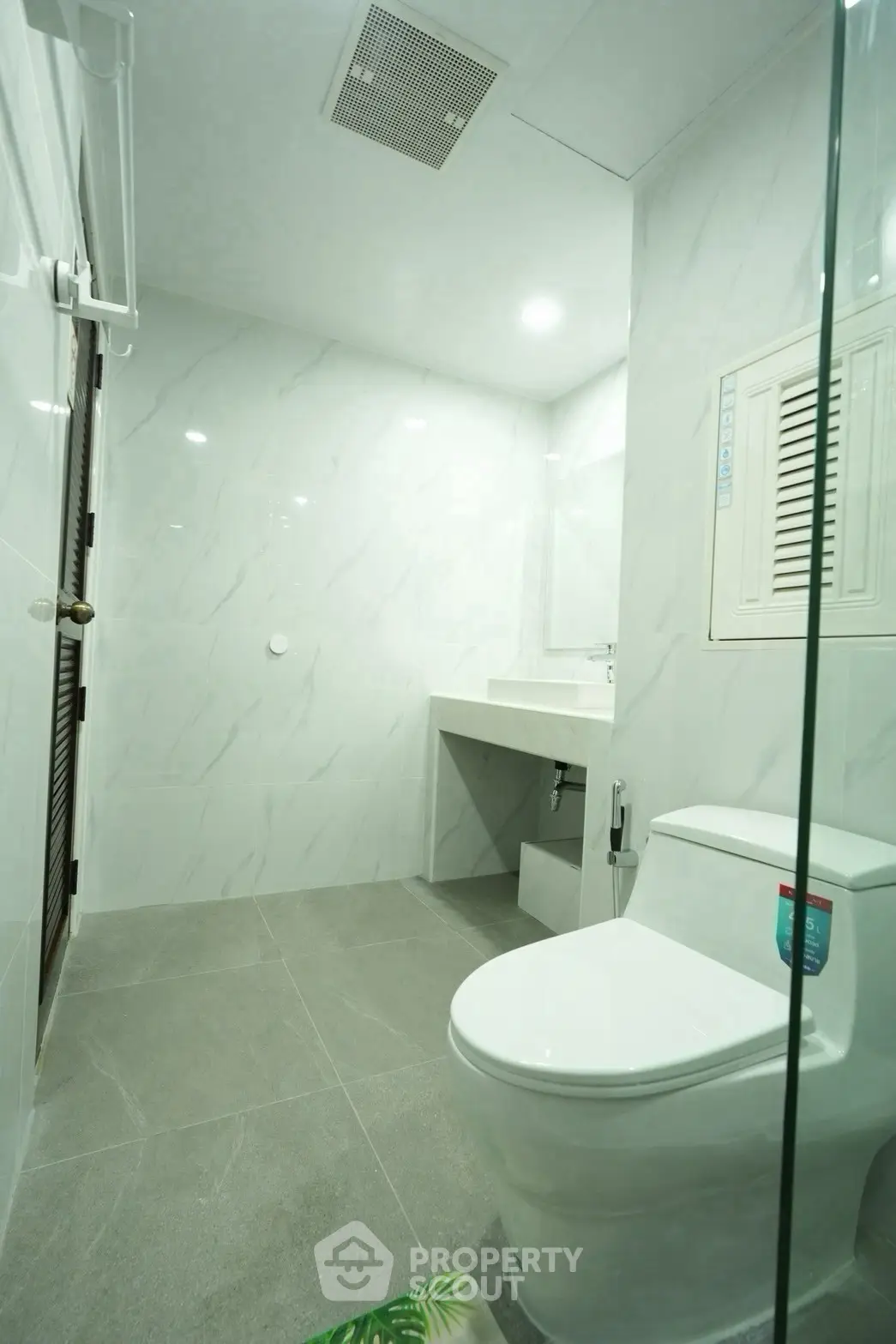 Modern bathroom with sleek design and elegant fixtures, featuring a spacious layout and contemporary style.