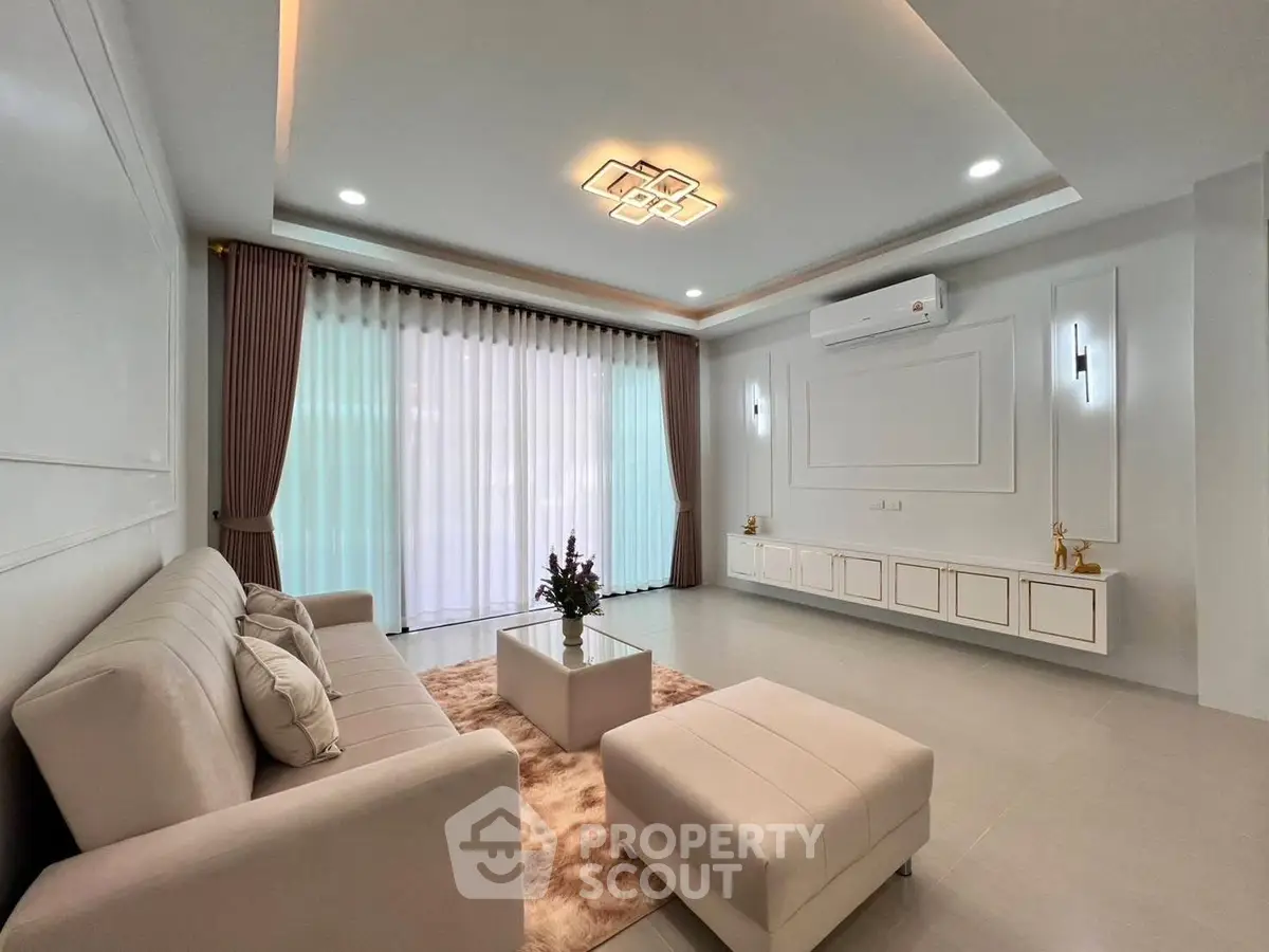 Elegant modern living room with plush sofa and stylish decor