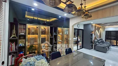 Luxurious living room with elegant lighting and modern decor