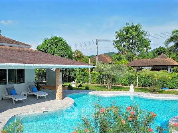 Luxurious villa with private pool and lush garden, perfect for serene living.