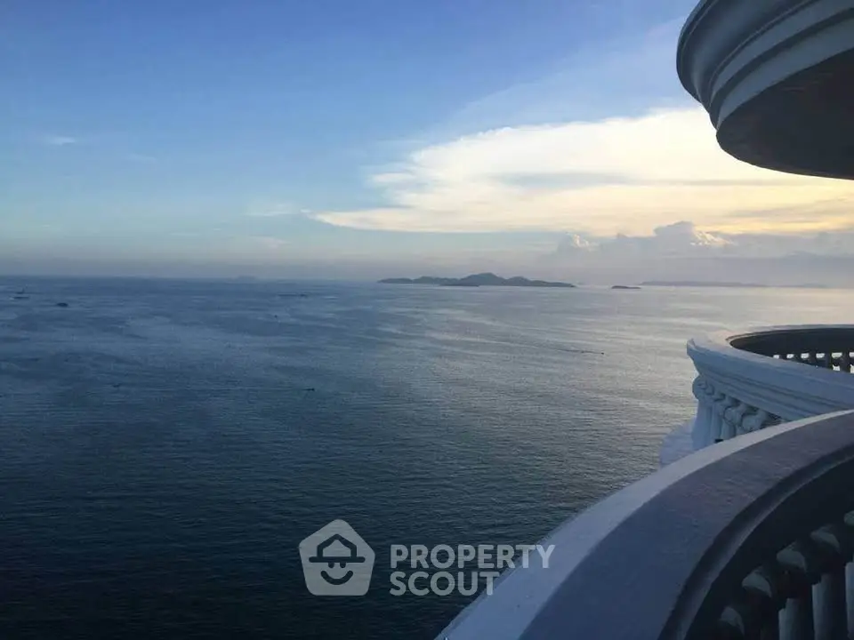 Stunning ocean view from a luxurious balcony at sunset, perfect for serene living.