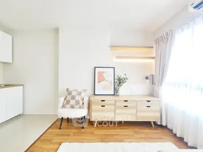 Bright modern living room with stylish decor and natural light