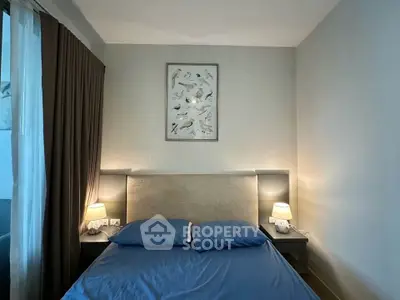 Cozy bedroom with elegant decor and soft lighting, perfect for relaxation and comfort.