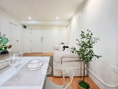 Modern living room with elegant decor and cozy seating area