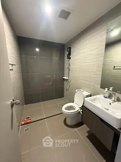 Modern bathroom with sleek design and spacious shower area