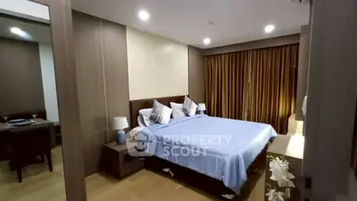 Spacious modern bedroom with cozy lighting and elegant decor