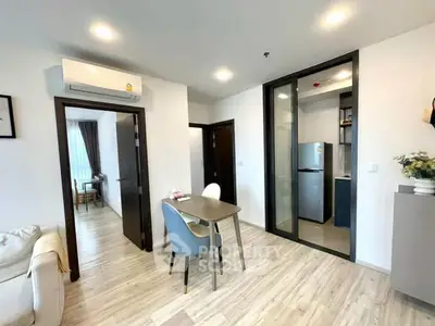 Modern living room with dining area and kitchen in open layout apartment