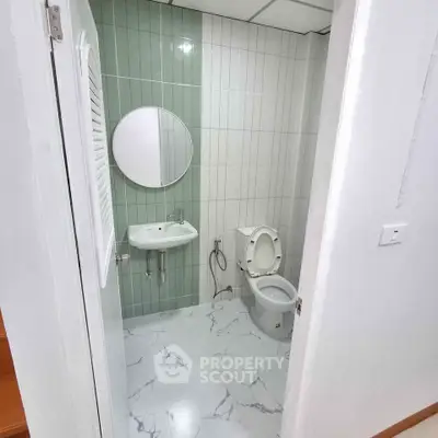 Modern bathroom with sleek design and marble flooring