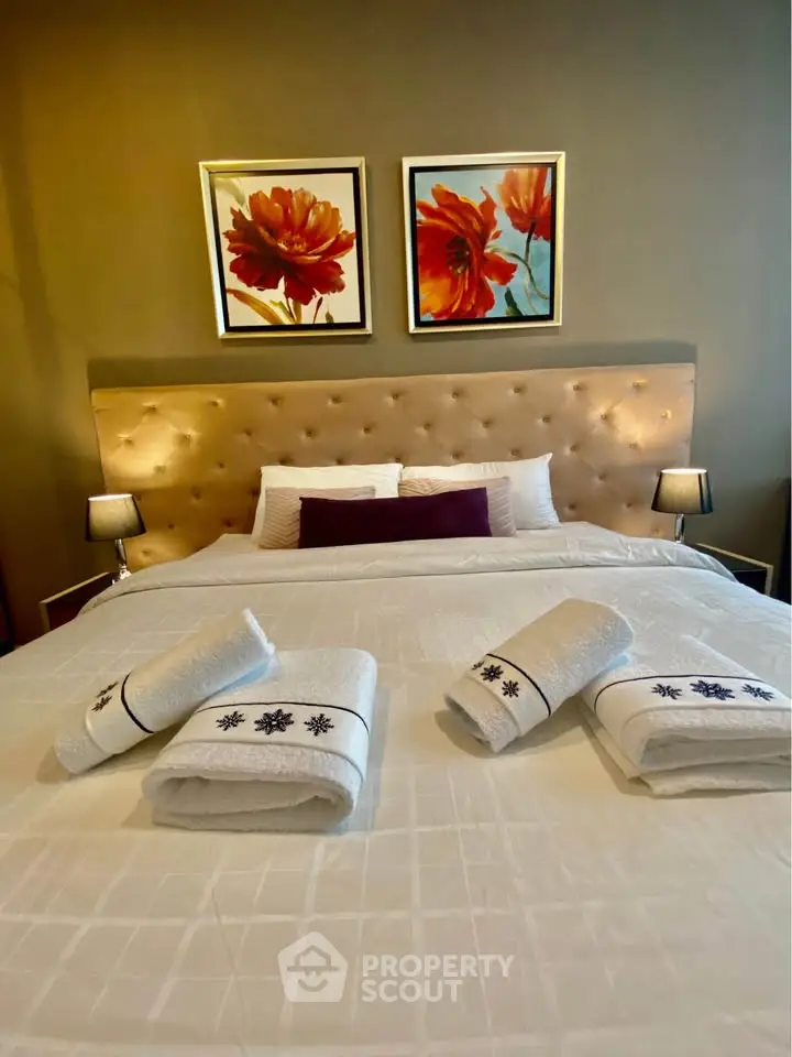 Luxurious bedroom with elegant decor and plush bedding, perfect for relaxation and comfort.
