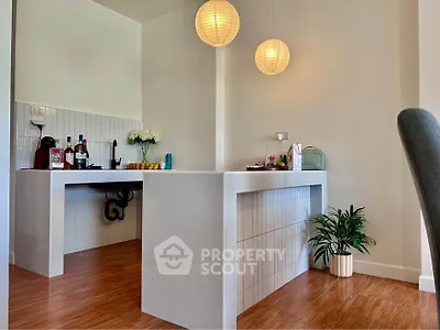 Modern kitchen with open layout and stylish lighting