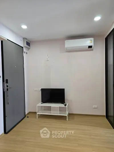 Modern living room with sleek air conditioning and minimalist decor