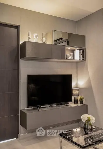 Modern living room with sleek TV unit and stylish decor