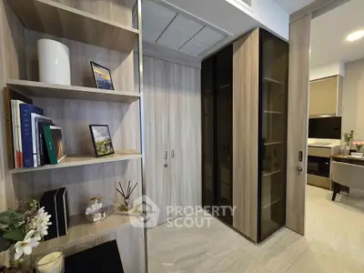 Modern interior with stylish shelving and sleek storage solutions in a contemporary living space.