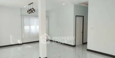 Spacious and bright interior with modern lighting and elegant flooring, perfect for customization.