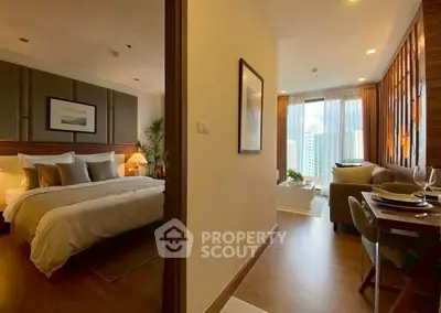 Luxurious modern apartment with elegant bedroom and cozy living area, featuring stylish decor and city views.