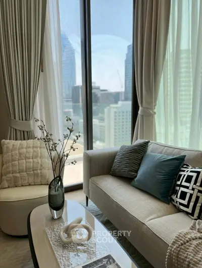 Luxurious living room with modern decor and stunning city view through large windows.