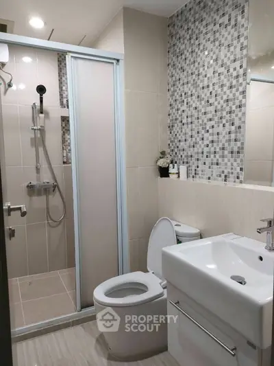 Modern bathroom with sleek shower and stylish tile design