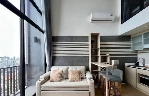 Modern high-rise apartment with stylish interior and city view balcony