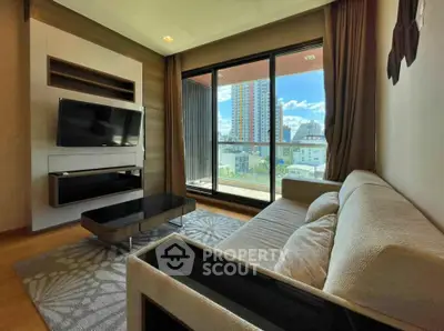 Modern living room with large window and city view, featuring a cozy sofa and wall-mounted TV.